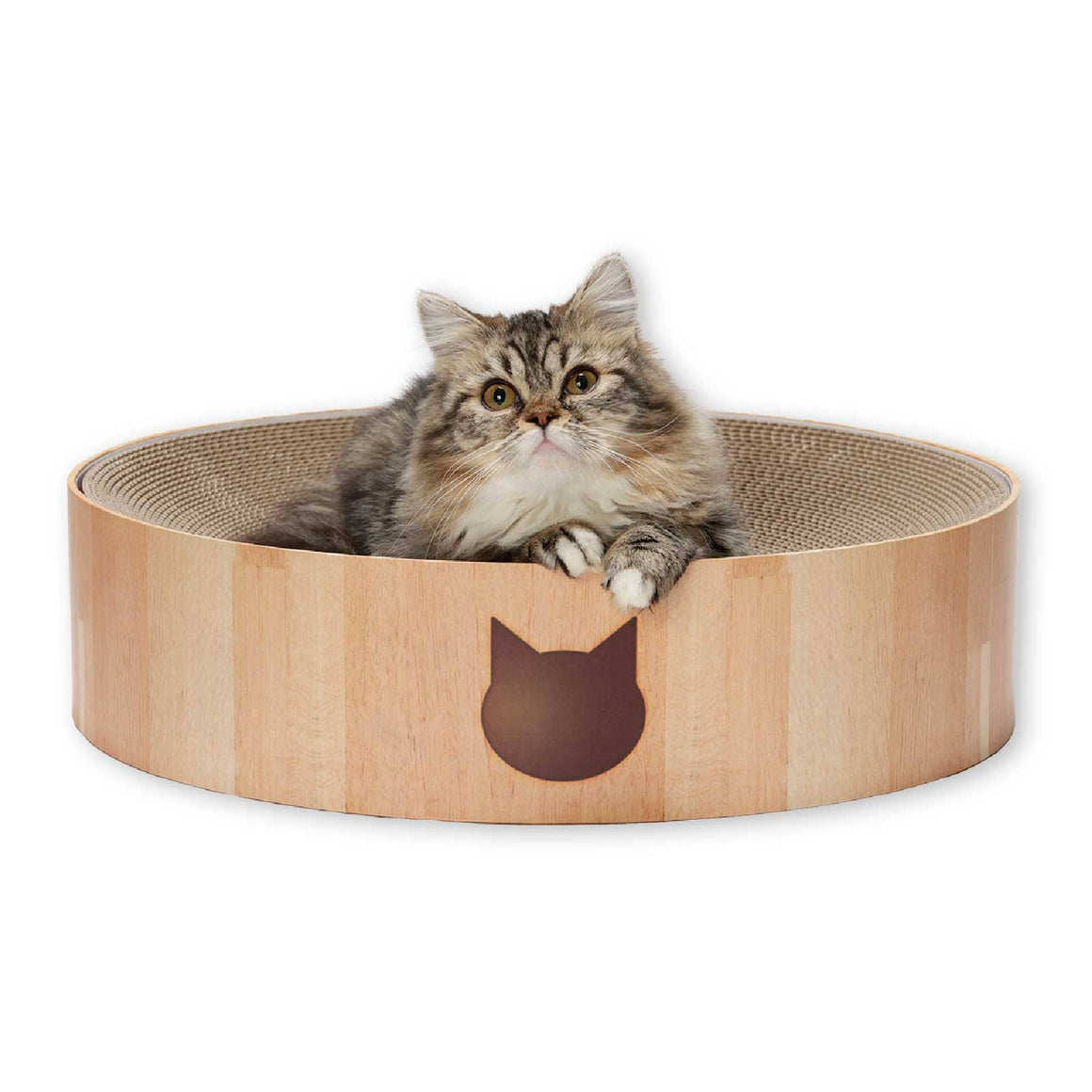 Fluffy cat sitting in a round wooden scratching bed.